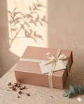 The Daily Ritual - rose-gold gift box with signature ribbon