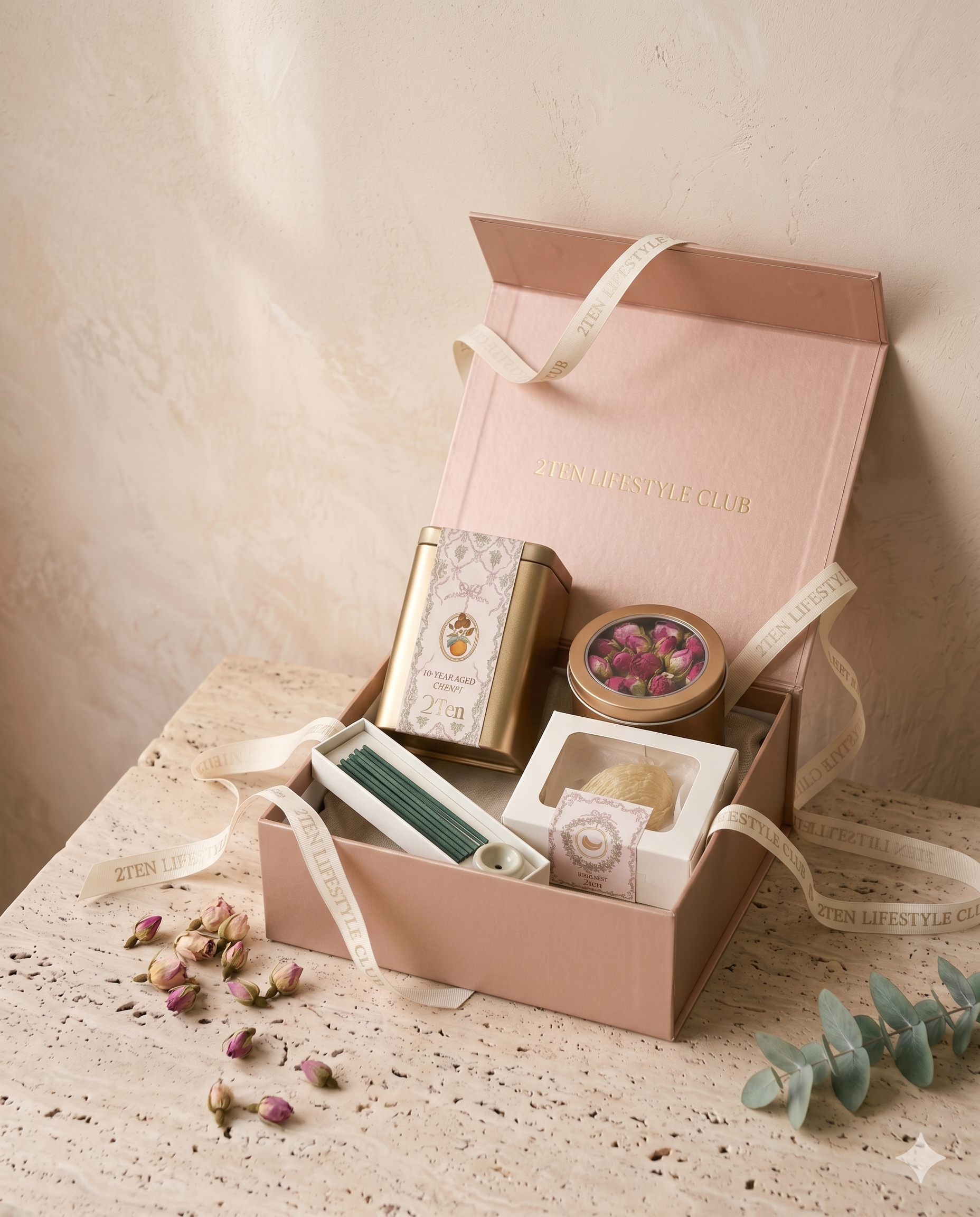 The Signature Wellness Set, open in its rose-gold box